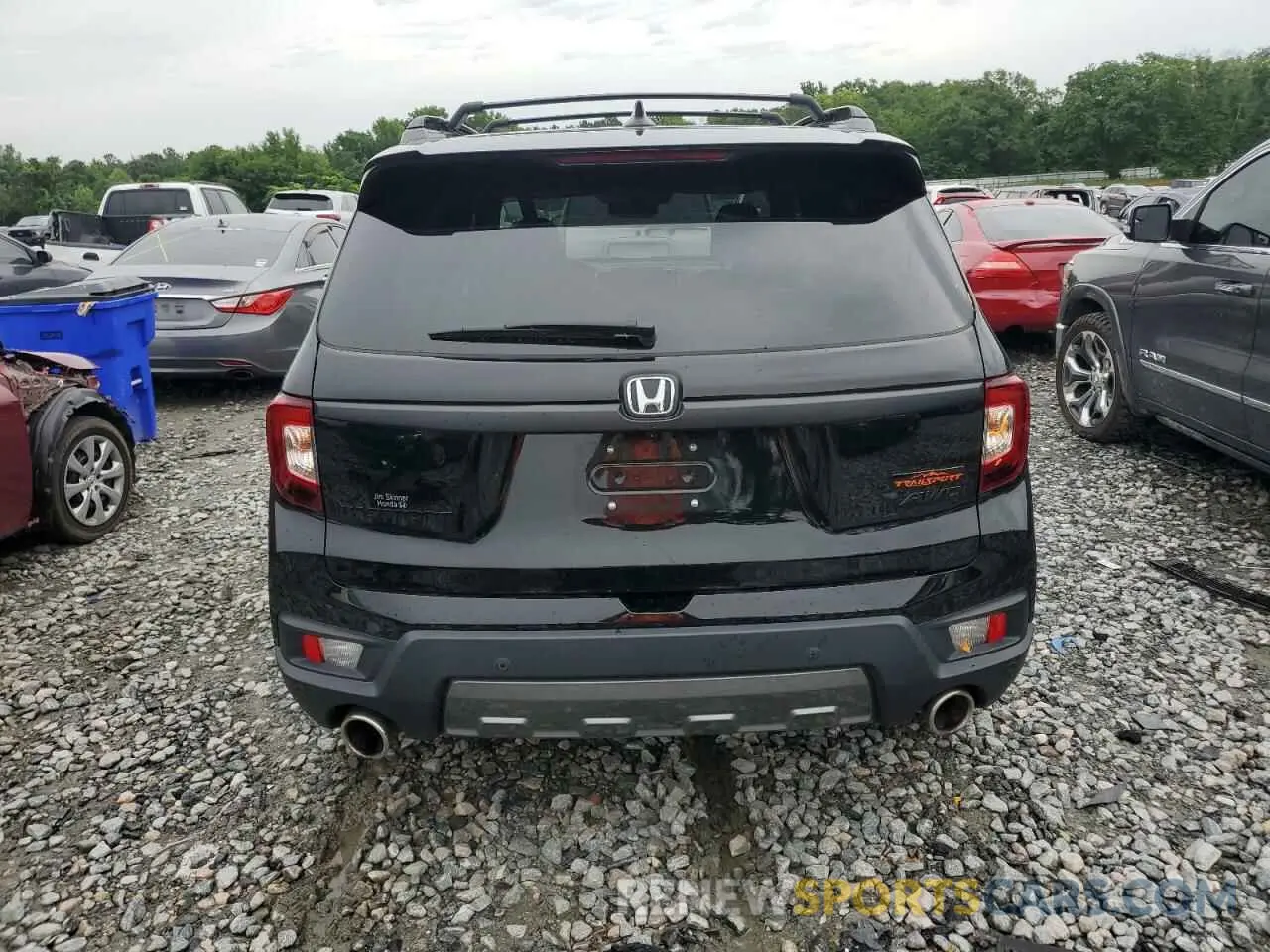 6 Photograph of a damaged car 5FNYF8H65PB000869 HONDA PASSPORT 2023
