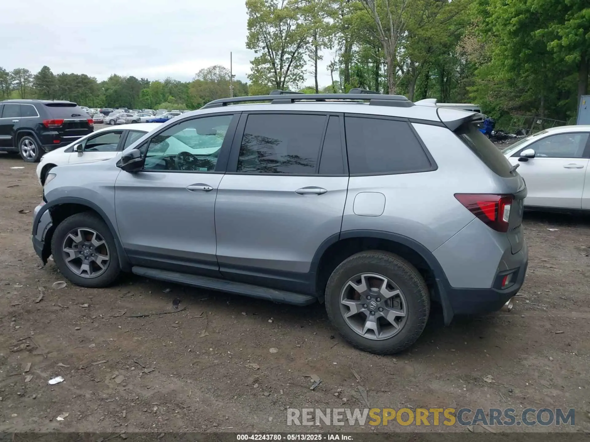 13 Photograph of a damaged car 5FNYF8H66PB024923 HONDA PASSPORT 2023
