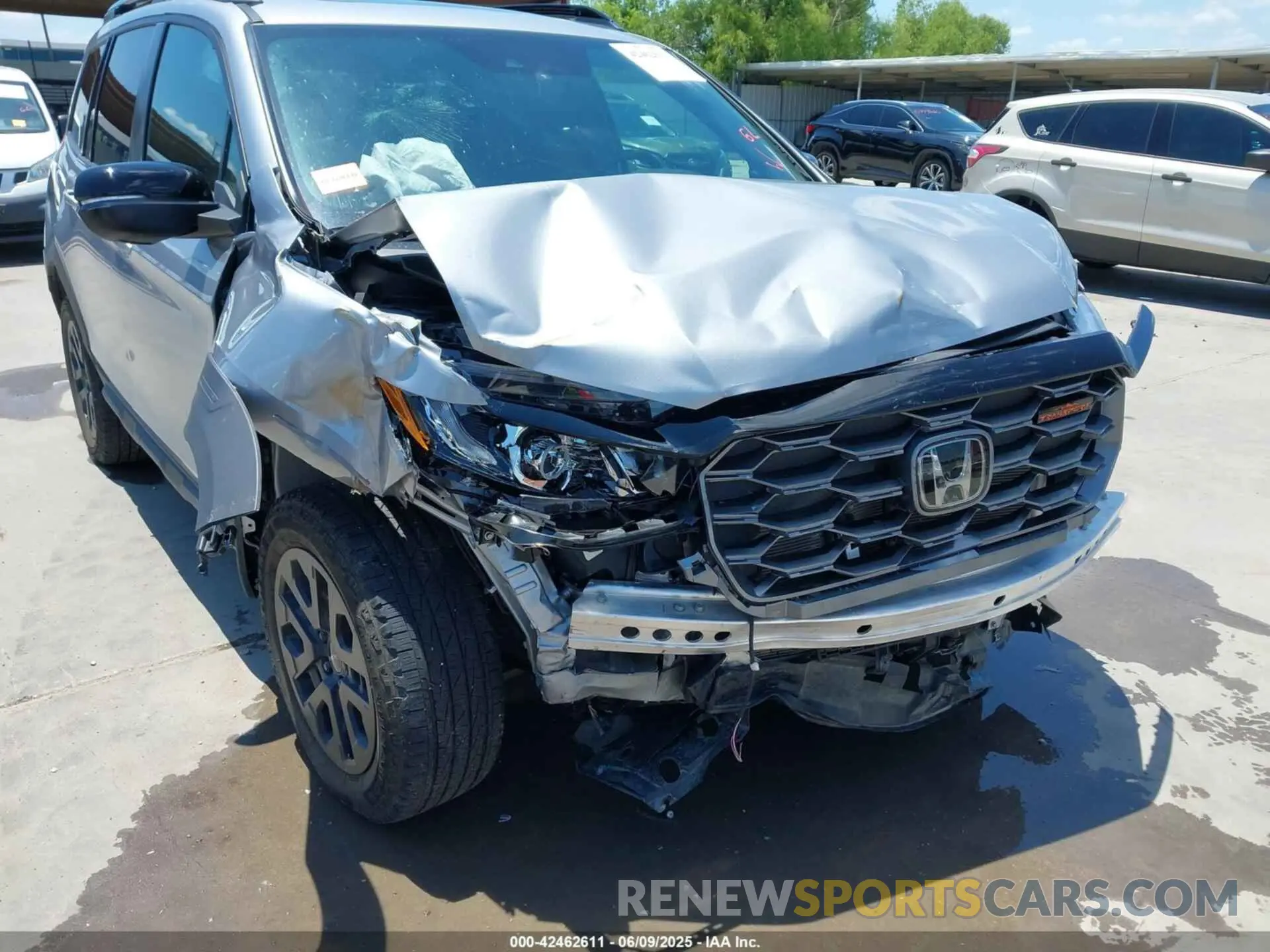 18 Photograph of a damaged car 5FNYF8H66PB044234 HONDA PASSPORT 2023