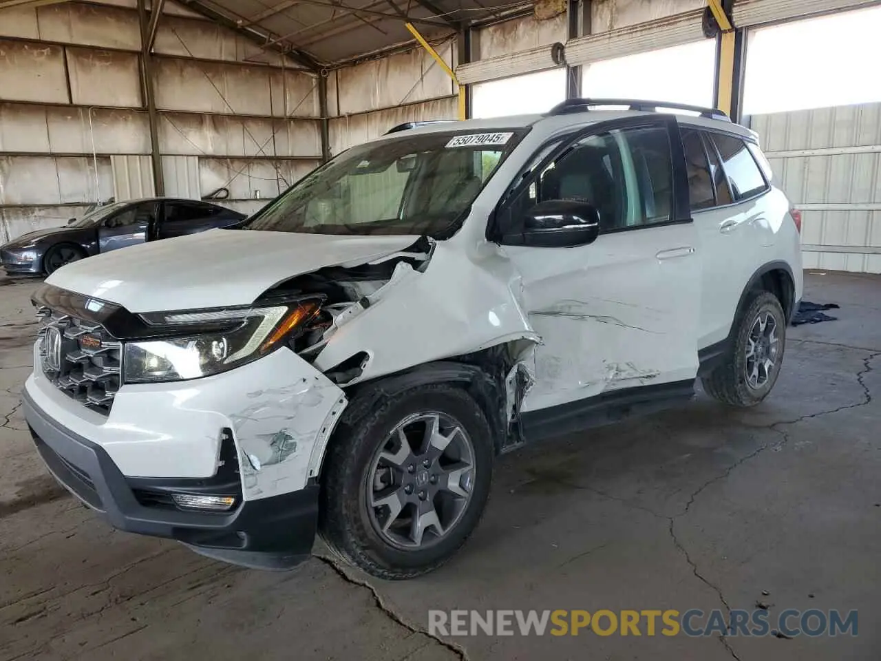 1 Photograph of a damaged car 5FNYF8H68PB000476 HONDA PASSPORT 2023