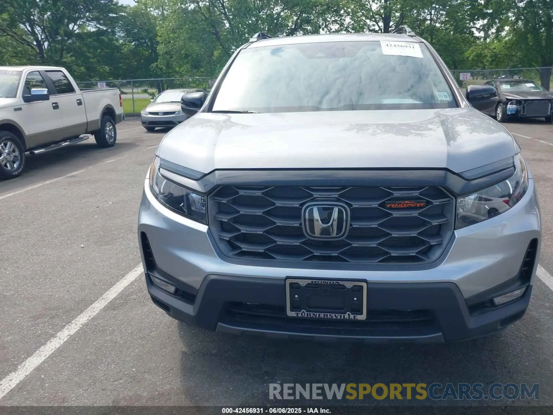 12 Photograph of a damaged car 5FNYF8H68PB043019 HONDA PASSPORT 2023