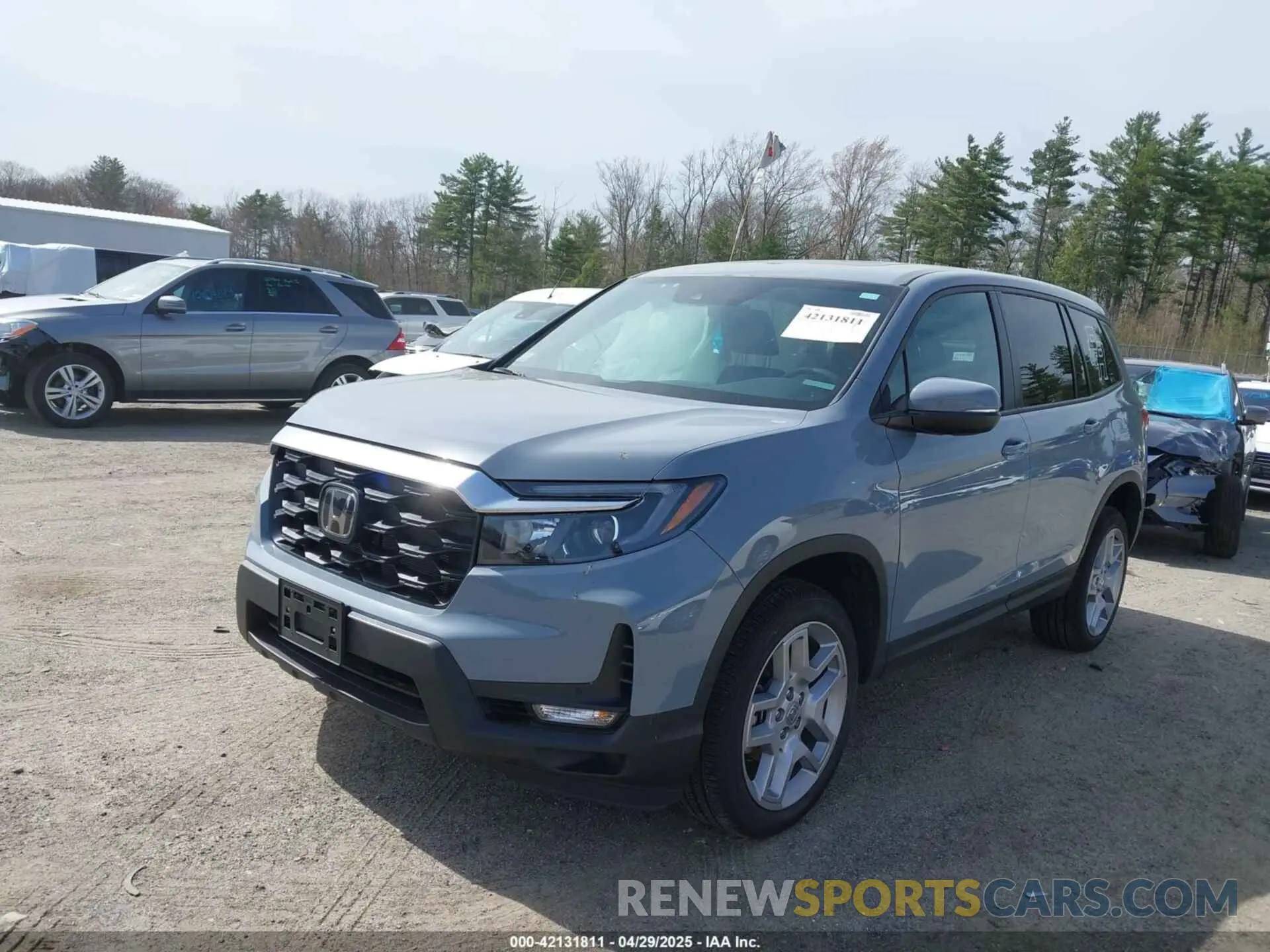2 Photograph of a damaged car 5FNYF8H55RB023059 HONDA PASSPORT 2024