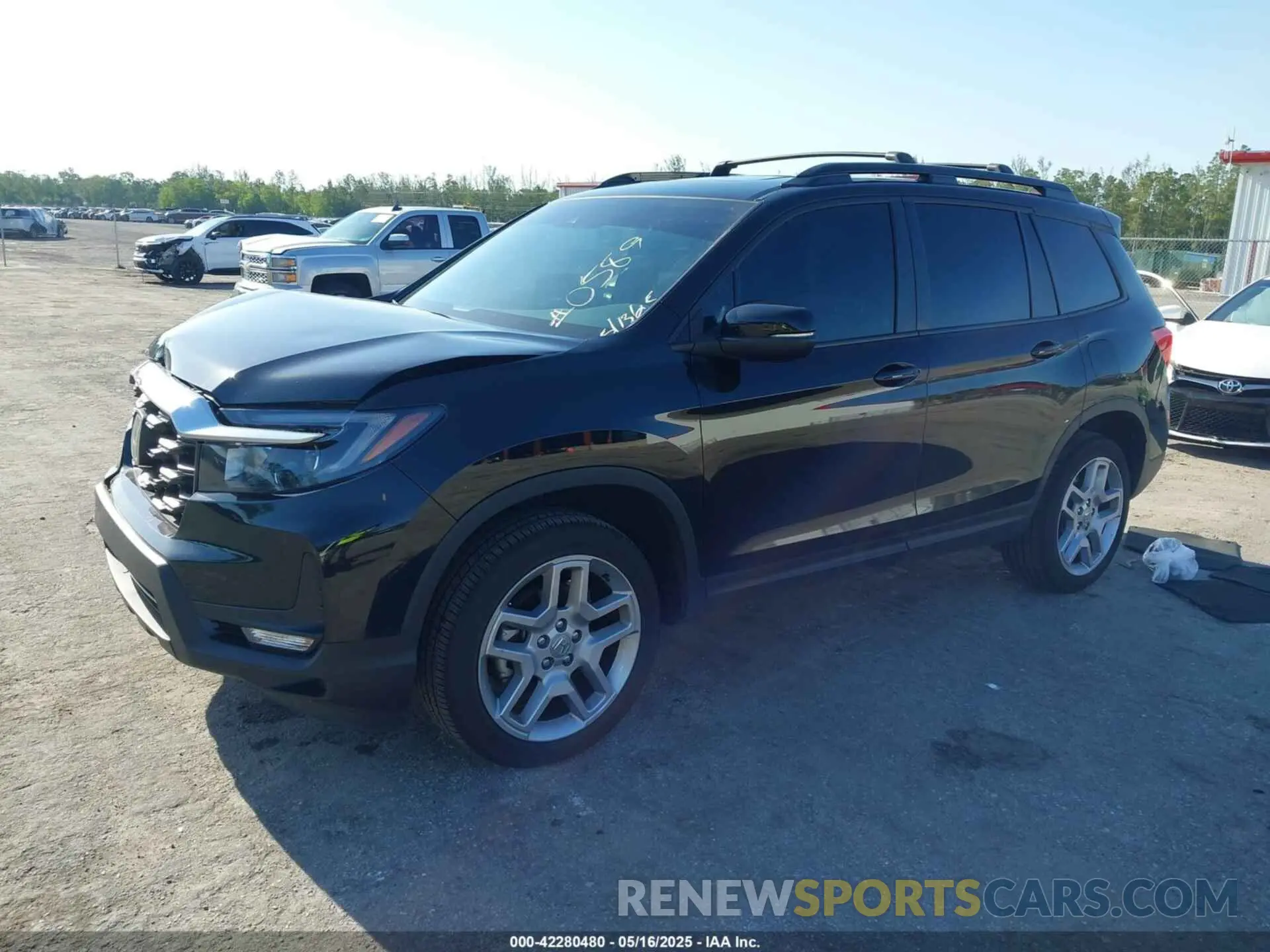 2 Photograph of a damaged car 5FNYF8H58RB020589 HONDA PASSPORT 2024