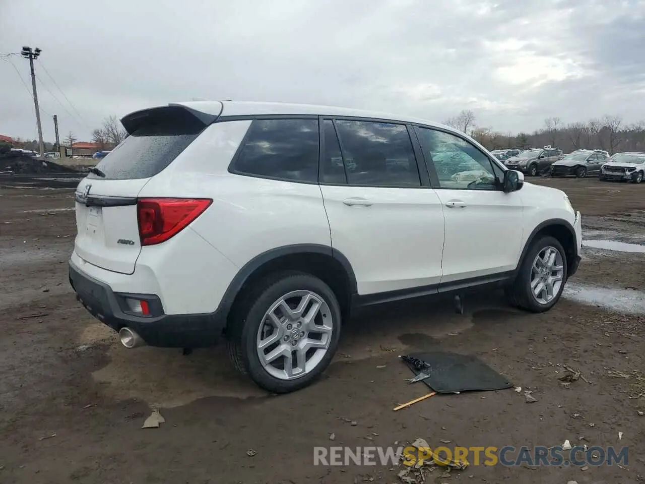 3 Photograph of a damaged car 5FNYF8H59RB011075 HONDA PASSPORT 2024