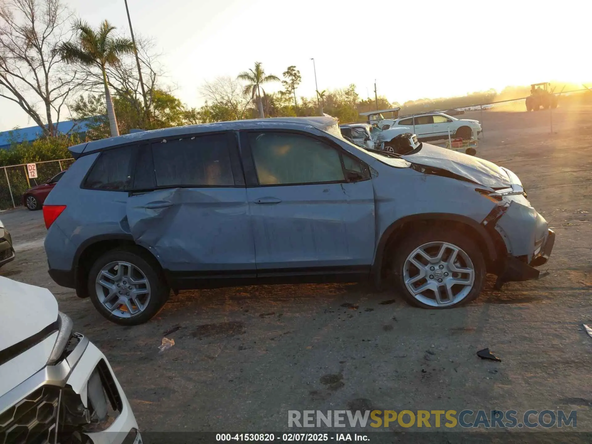 14 Photograph of a damaged car 5FNYF8H5XRB017807 HONDA PASSPORT 2024