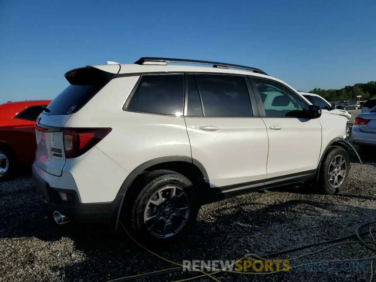 3 Photograph of a damaged car 5FNYF8H62RB004333 HONDA PASSPORT 2024