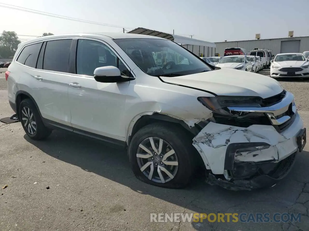 4 Photograph of a damaged car 5FNYF5H36KB021310 HONDA PILOT 2019