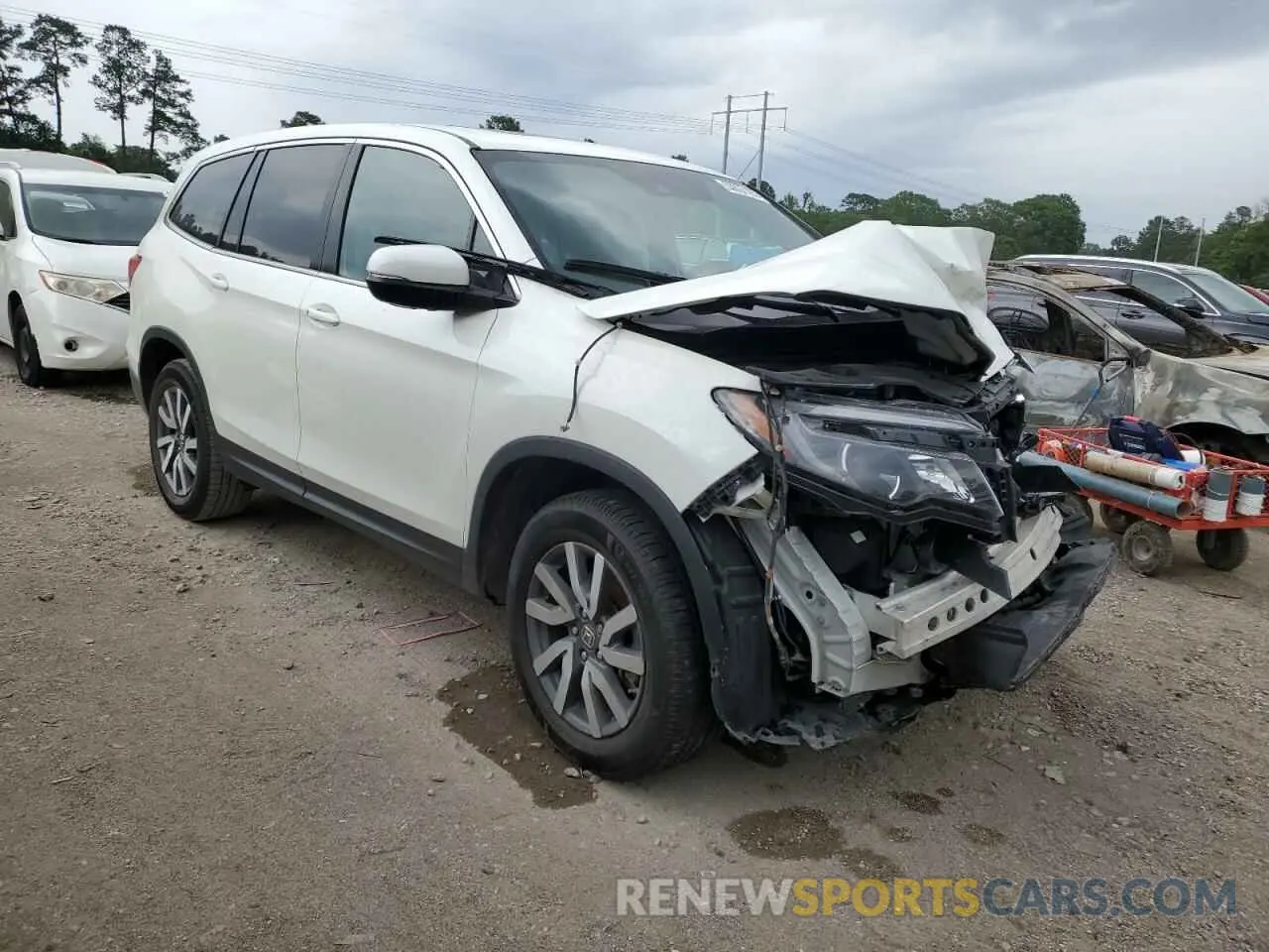 4 Photograph of a damaged car 5FNYF5H44KB004997 HONDA PILOT 2019
