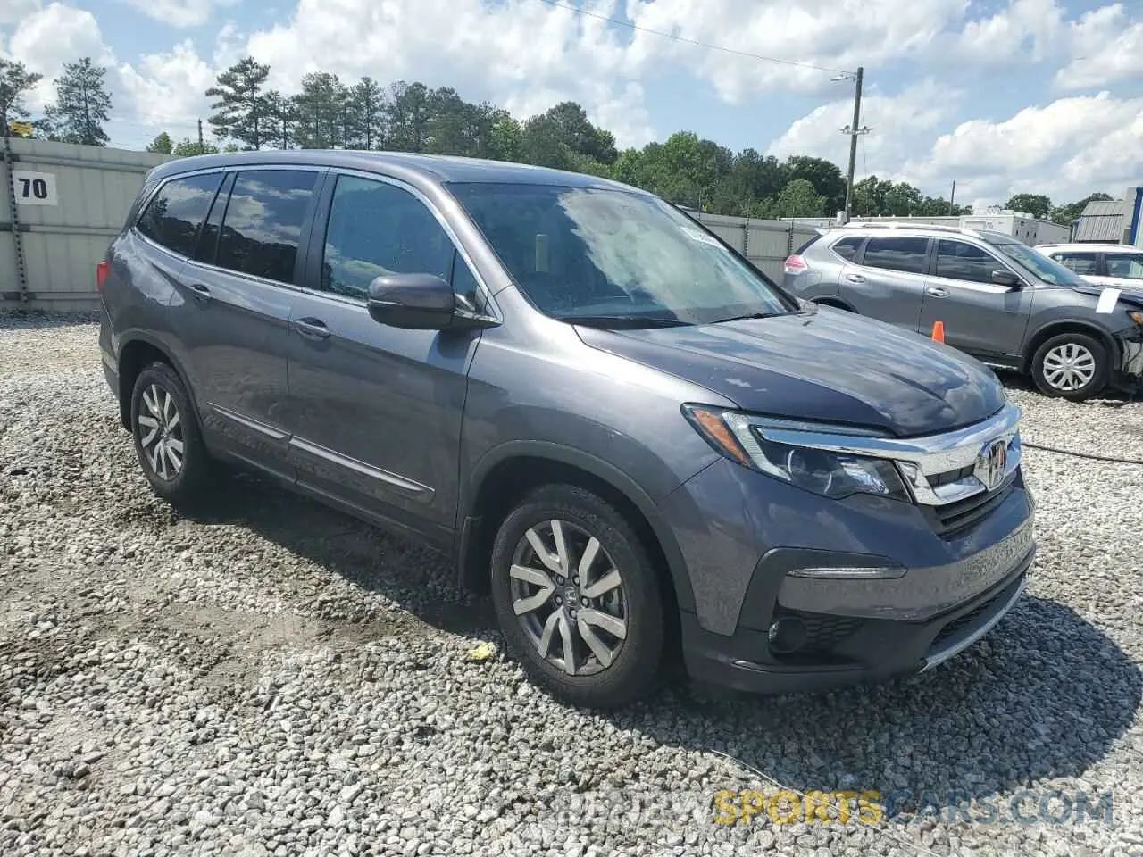 4 Photograph of a damaged car 5FNYF5H59KB028124 HONDA PILOT 2019