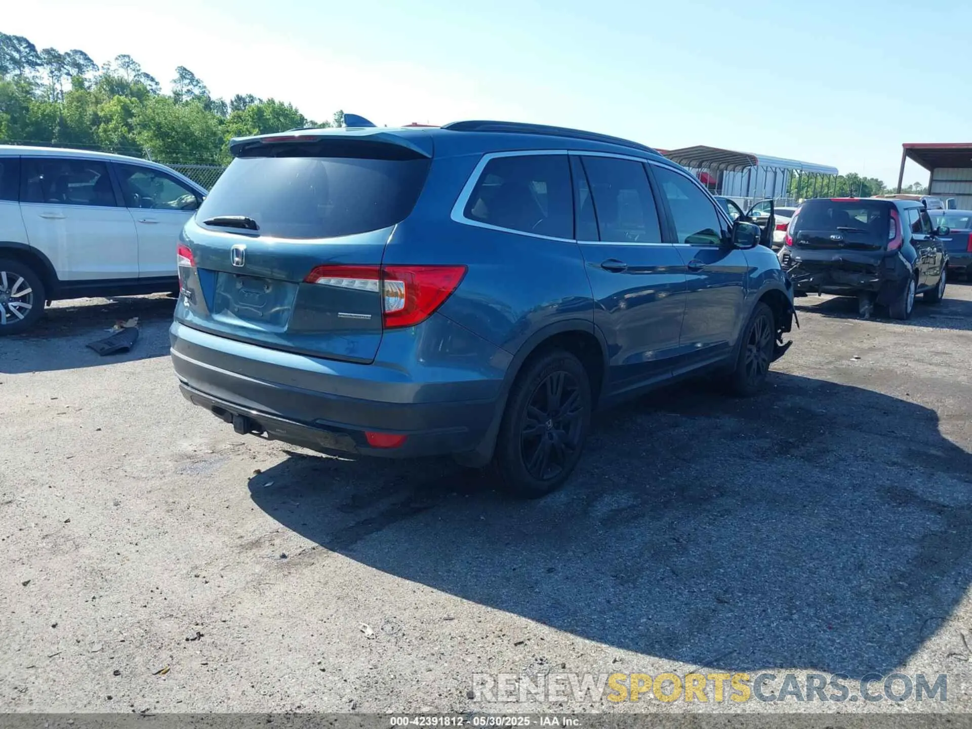 4 Photograph of a damaged car 5FNYF5H27MB012769 HONDA PILOT 2021