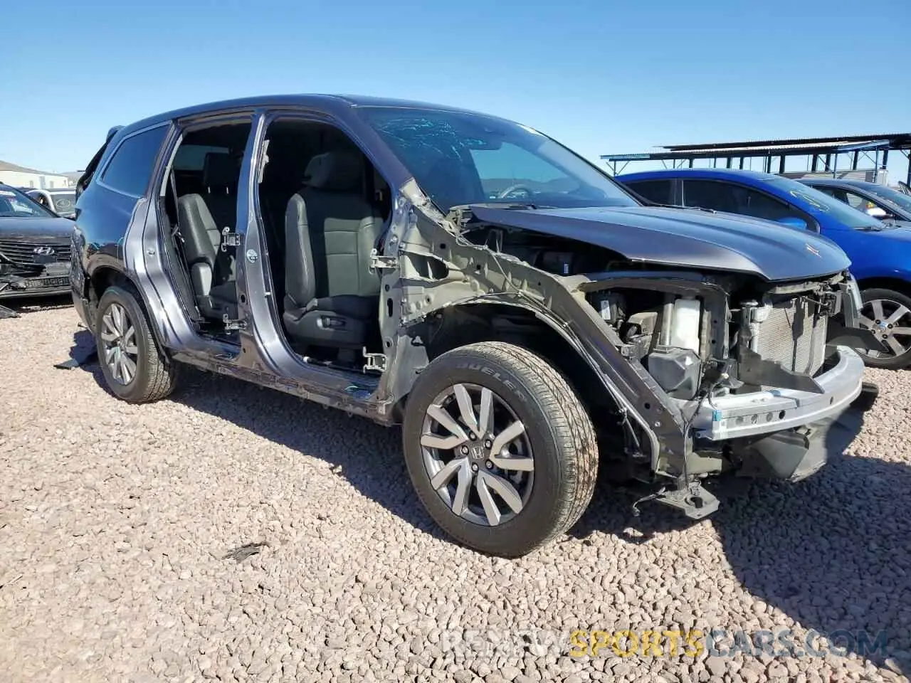 4 Photograph of a damaged car 5FNYF5H56MB007234 HONDA PILOT 2021