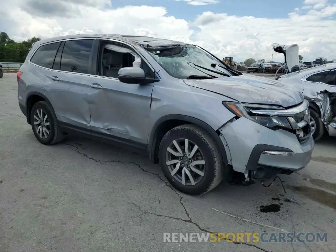 4 Photograph of a damaged car 5FNYF5H58MB008921 HONDA PILOT 2021
