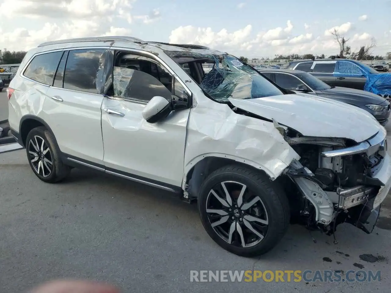 4 Photograph of a damaged car 5FNYF6H00MB064376 HONDA PILOT 2021