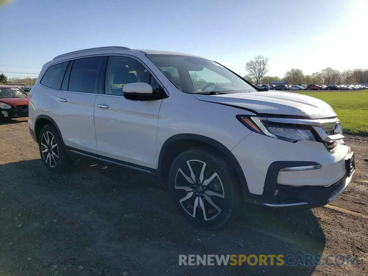 4 Photograph of a damaged car 5FNYF6H05MB004870 HONDA PILOT 2021