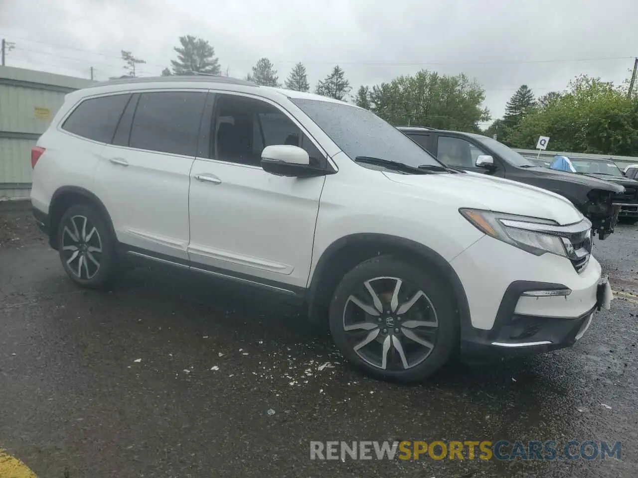 4 Photograph of a damaged car 5FNYF6H06MB023850 HONDA PILOT 2021