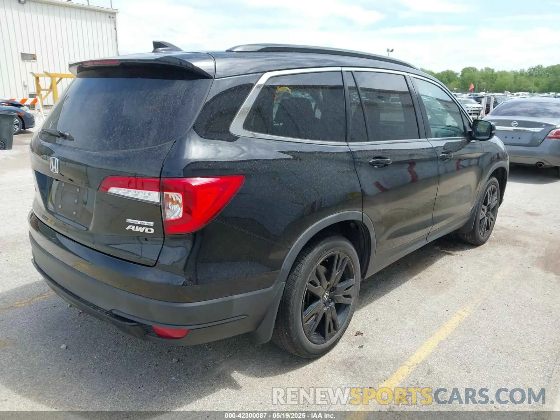 4 Photograph of a damaged car 5FNYF6H20MB023974 HONDA PILOT 2021