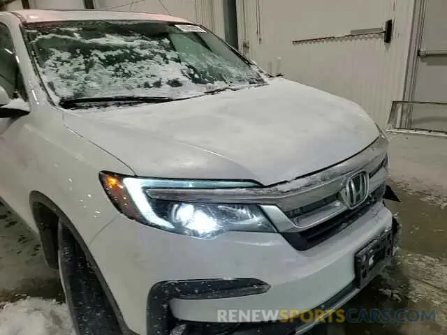 11 Photograph of a damaged car 5FNYF6H56MB007952 HONDA PILOT 2021