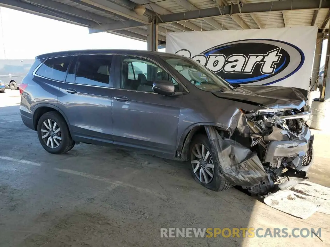 4 Photograph of a damaged car 5FNYF6H58MB001098 HONDA PILOT 2021