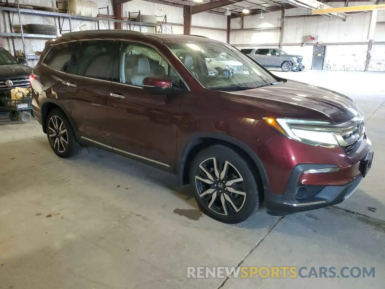 4 Photograph of a damaged car 5FNYF6H91MB002628 HONDA PILOT 2021