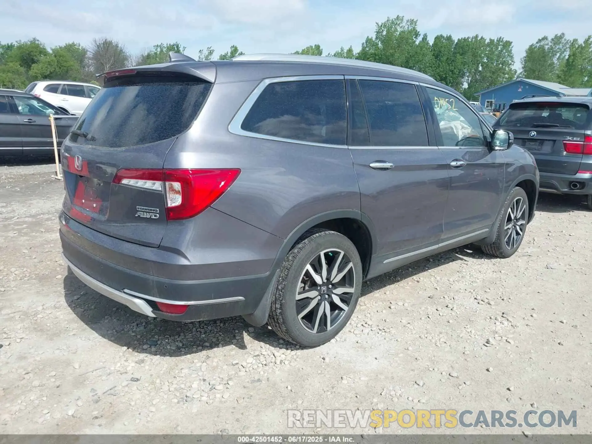 4 Photograph of a damaged car 5FNYF6H95MB075033 HONDA PILOT 2021