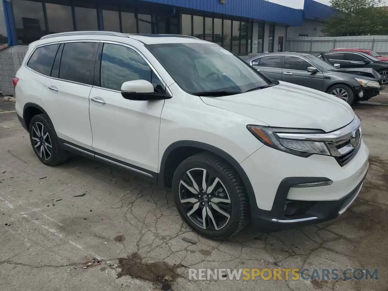 4 Photograph of a damaged car 5FNYF6H96MB002592 HONDA PILOT 2021