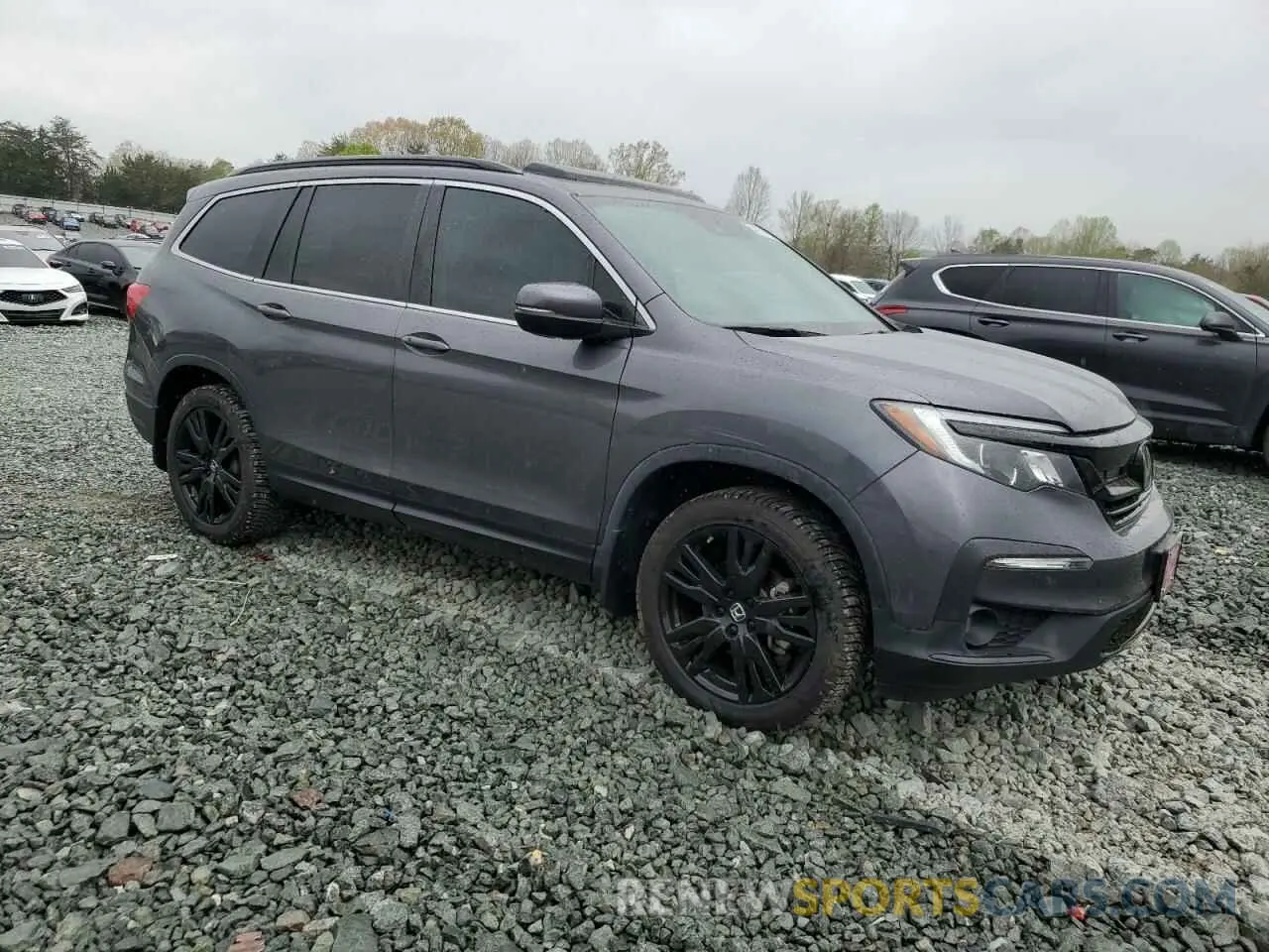 4 Photograph of a damaged car 5FNYF5H21NB023624 HONDA PILOT 2022