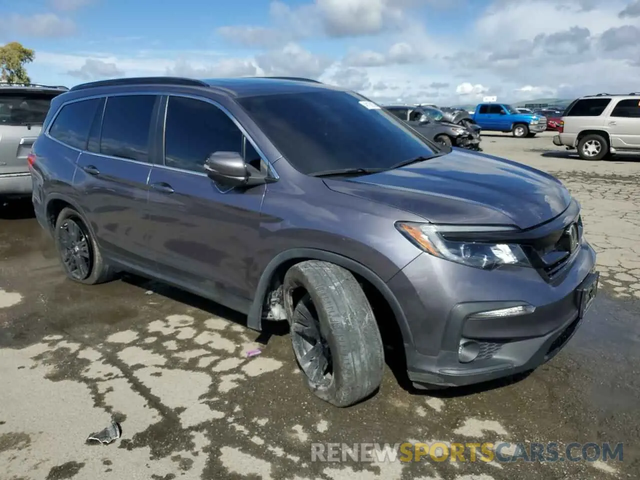 4 Photograph of a damaged car 5FNYF5H22NB008789 HONDA PILOT 2022