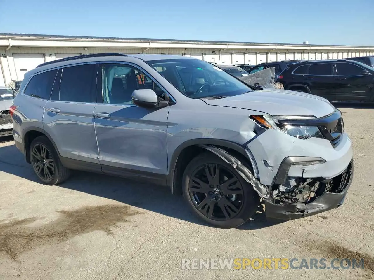 4 Photograph of a damaged car 5FNYF5H29NB026593 HONDA PILOT 2022