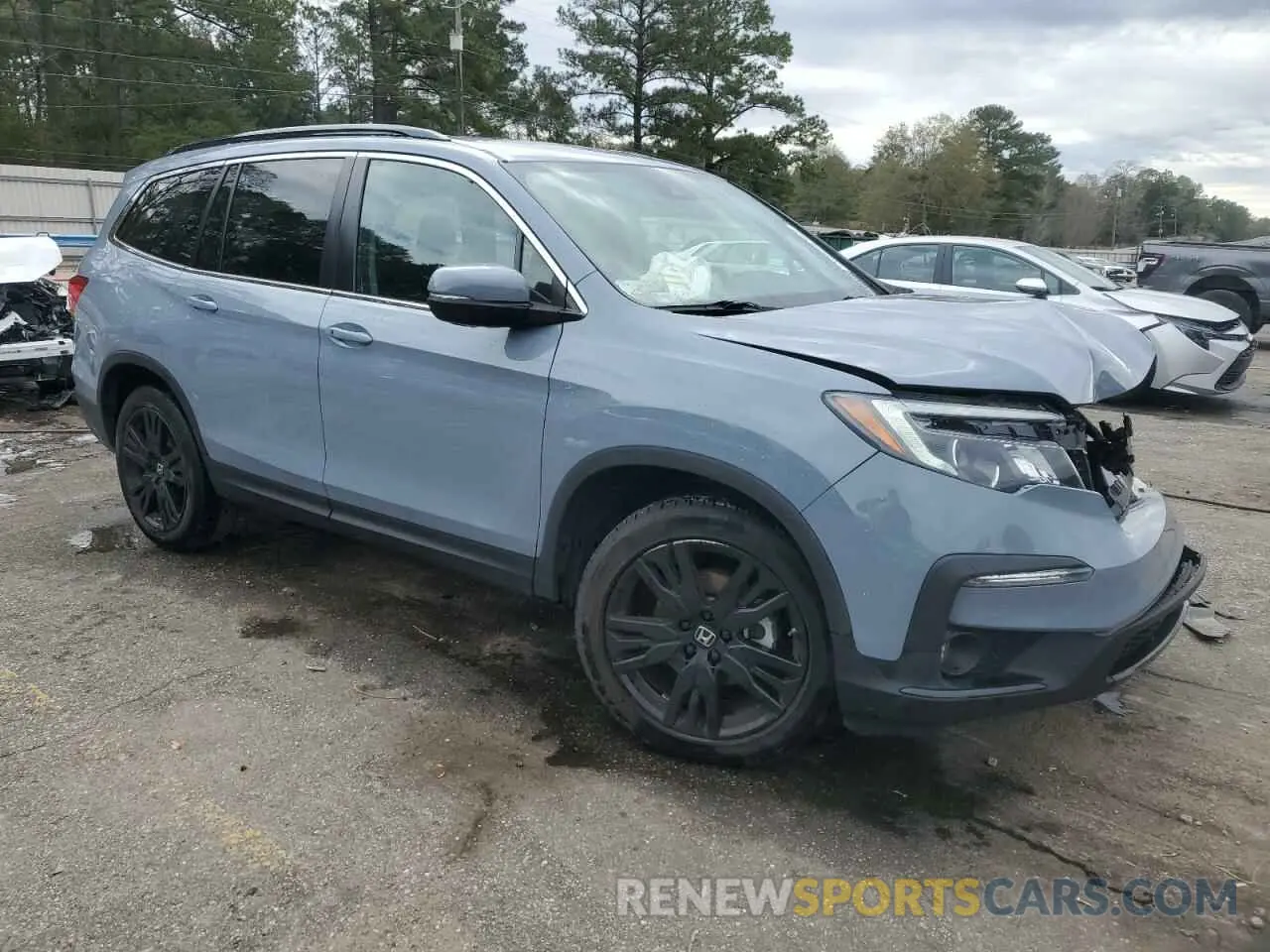 4 Photograph of a damaged car 5FNYF5H2XNB035139 HONDA PILOT 2022