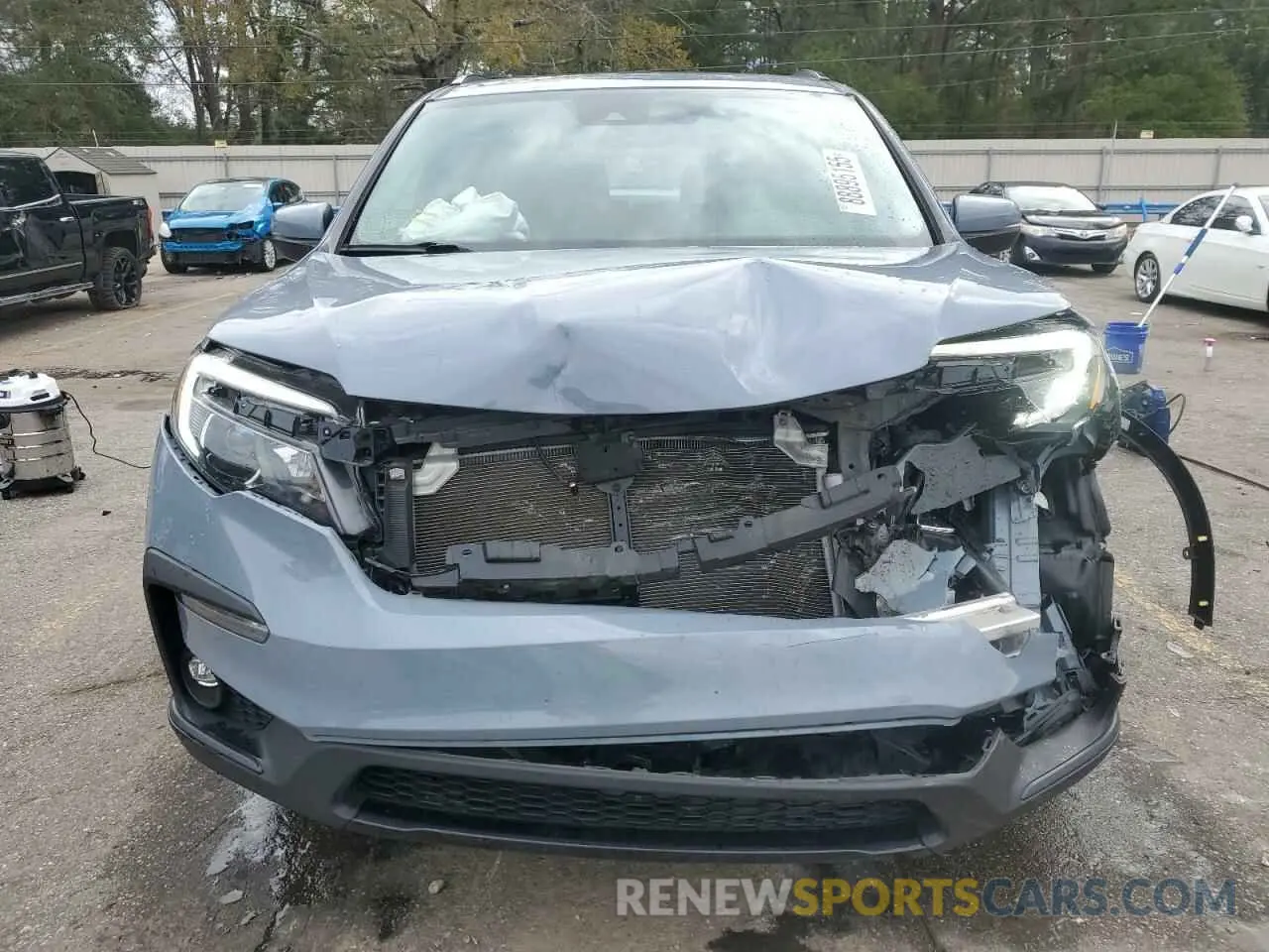 5 Photograph of a damaged car 5FNYF5H2XNB035139 HONDA PILOT 2022