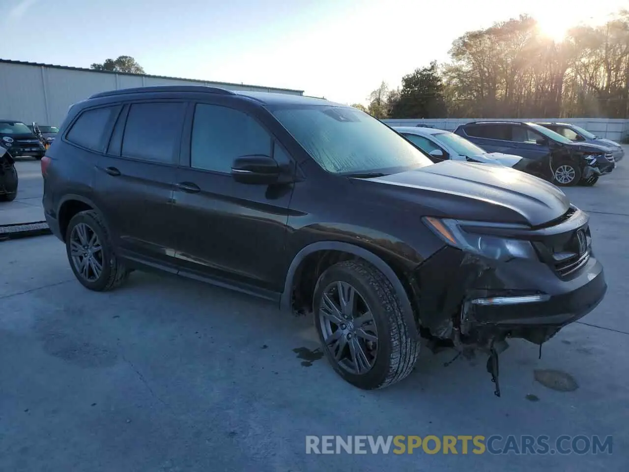 4 Photograph of a damaged car 5FNYF5H30NB007228 HONDA PILOT 2022