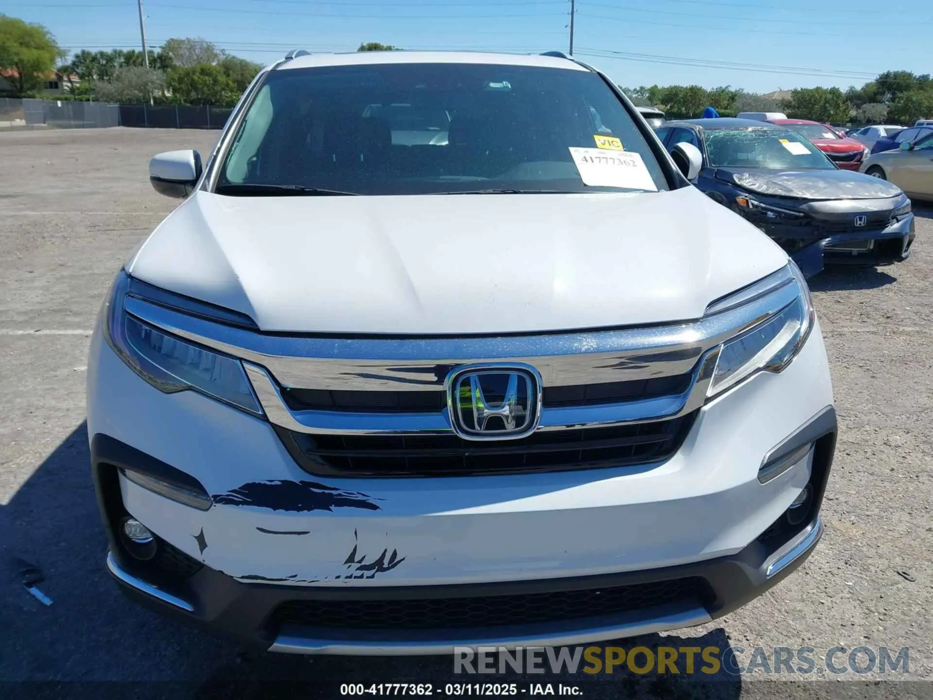 11 Photograph of a damaged car 5FNYF5H66NB034248 HONDA PILOT 2022