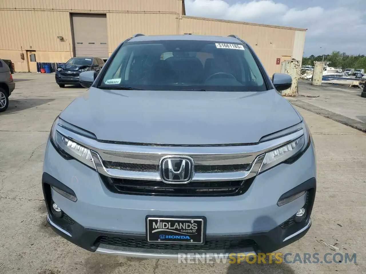 5 Photograph of a damaged car 5FNYF5H69NB031540 HONDA PILOT 2022