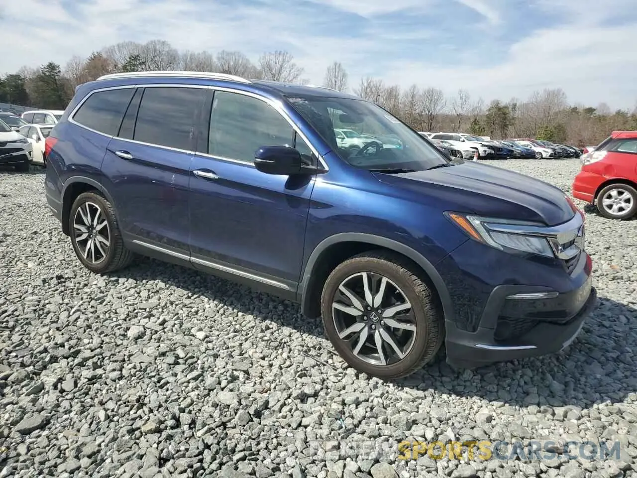 4 Photograph of a damaged car 5FNYF5H94NB001839 HONDA PILOT 2022