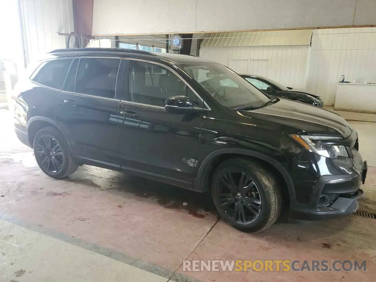 4 Photograph of a damaged car 5FNYF6H26NB094534 HONDA PILOT 2022