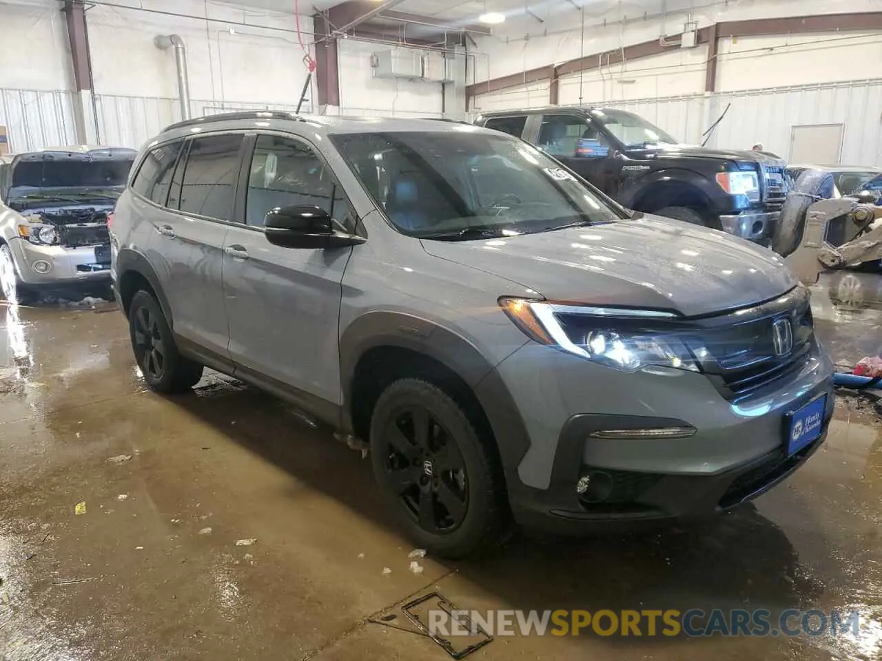4 Photograph of a damaged car 5FNYF6H84NB051623 HONDA PILOT 2022