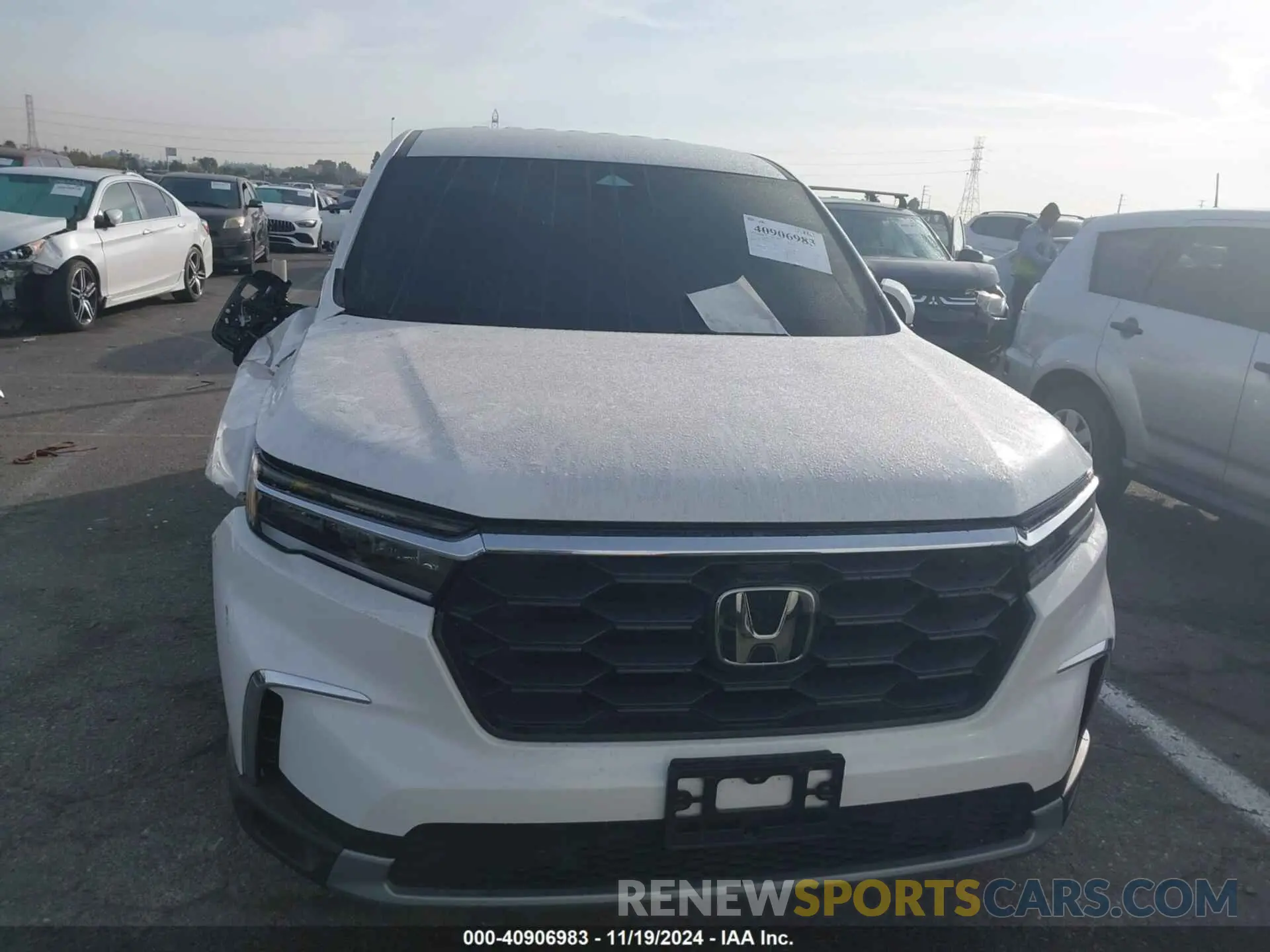 11 Photograph of a damaged car 5FNYG1H5XPB037931 HONDA PILOT 2023