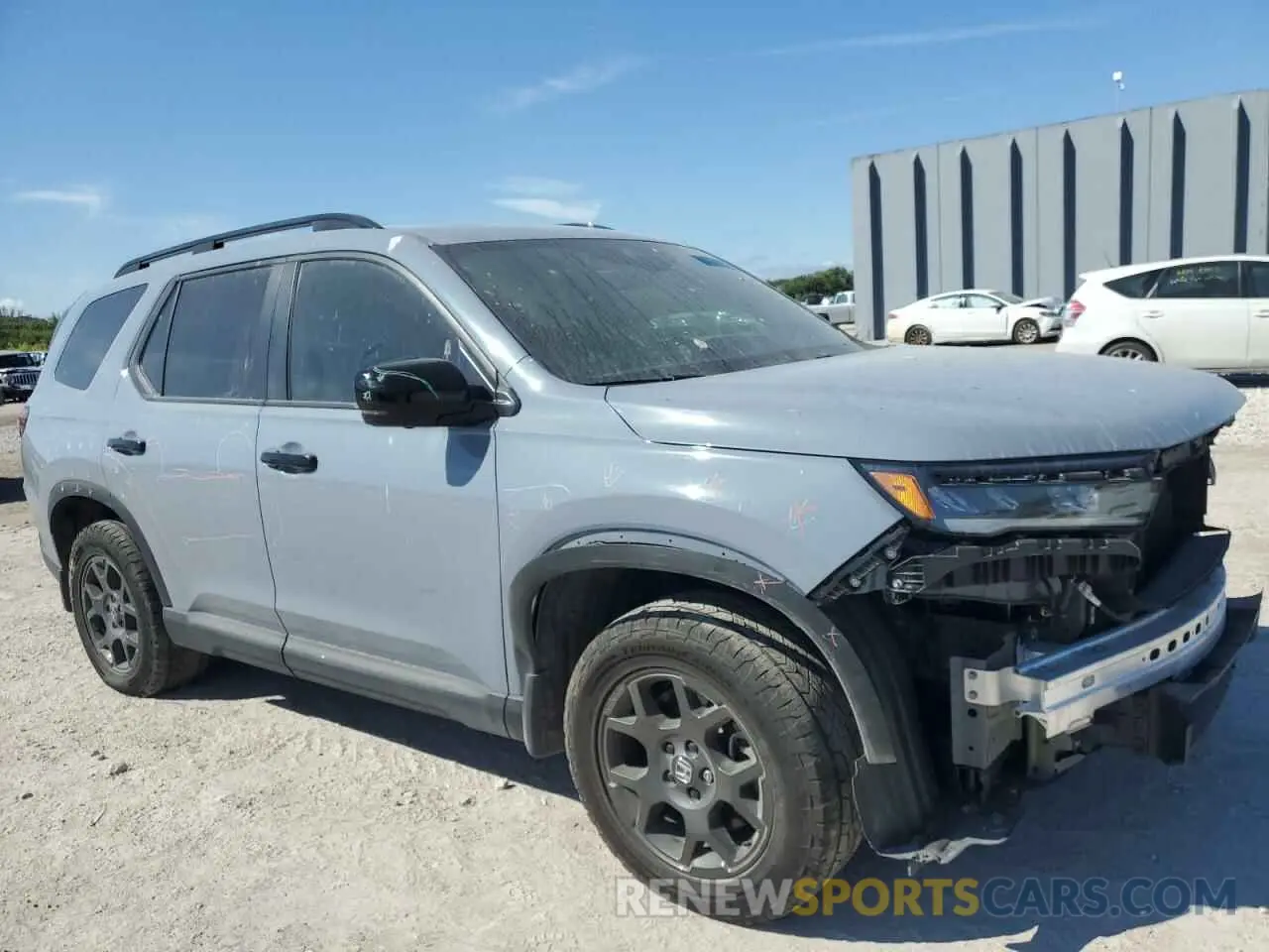 4 Photograph of a damaged car 5FNYG1H63PB057270 HONDA PILOT 2023
