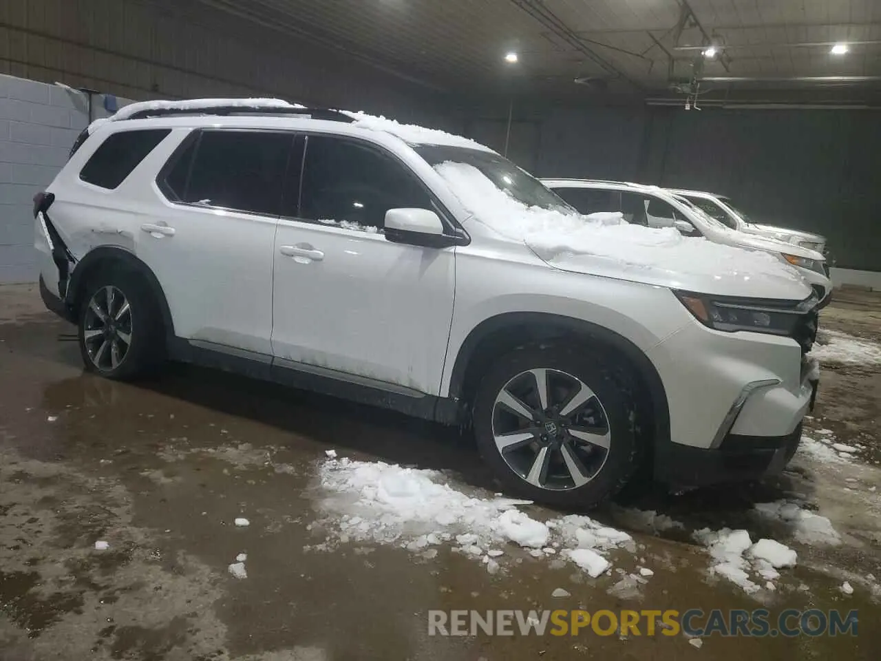 4 Photograph of a damaged car 5FNYG1H75PB013666 HONDA PILOT 2023