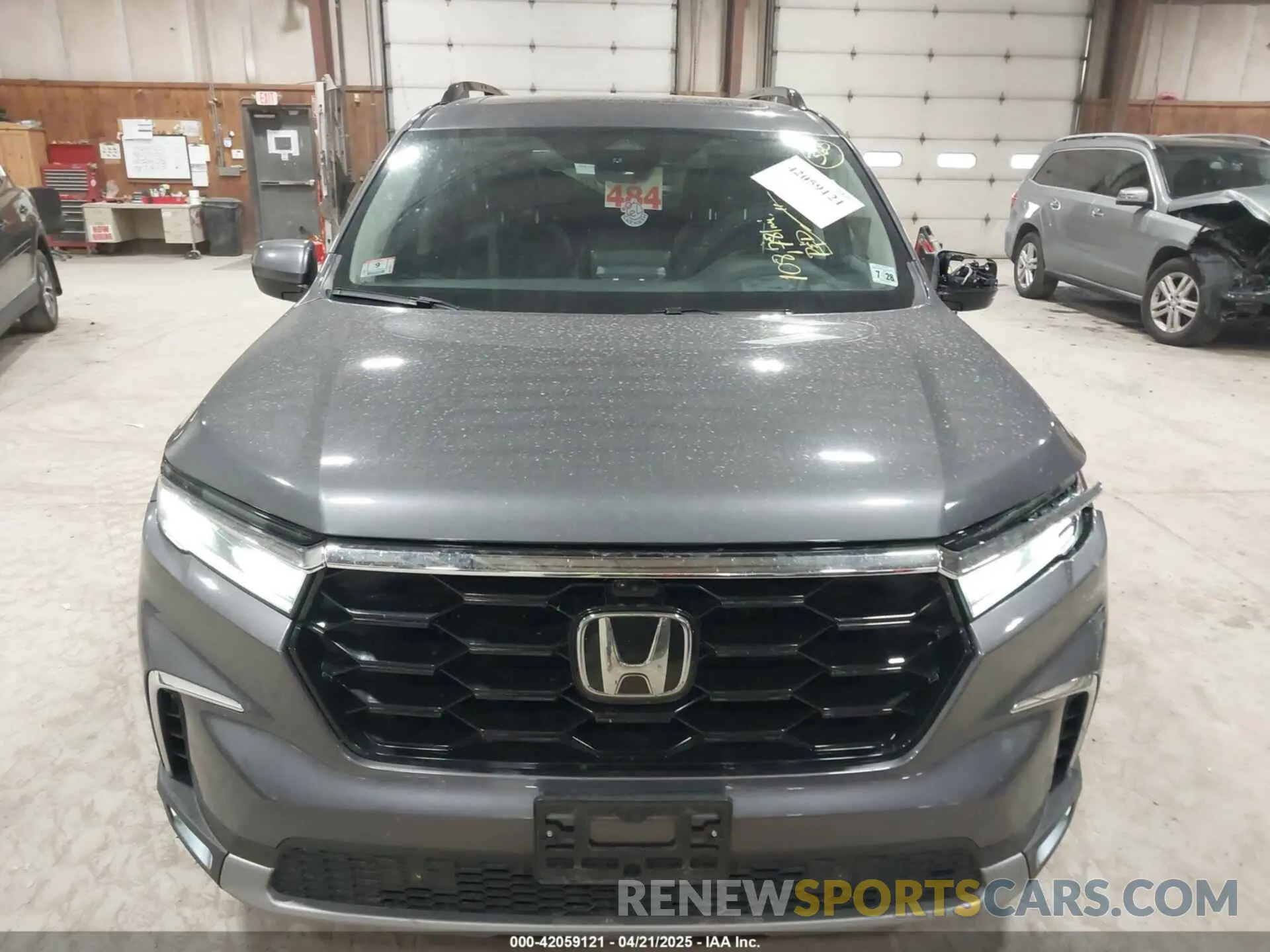 12 Photograph of a damaged car 5FNYG1H80PB026995 HONDA PILOT 2023