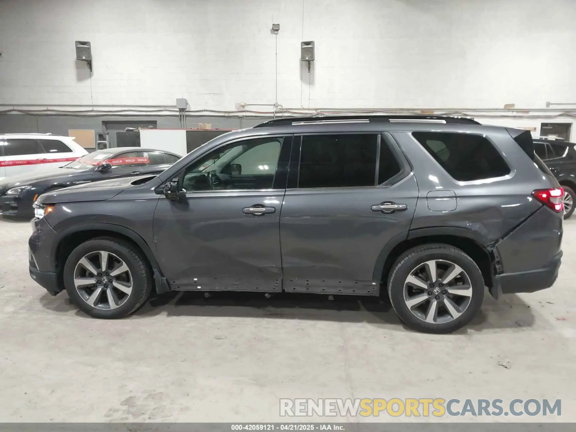 14 Photograph of a damaged car 5FNYG1H80PB026995 HONDA PILOT 2023