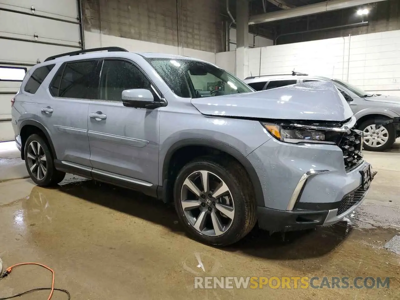 4 Photograph of a damaged car 5FNYG1H89PB043021 HONDA PILOT 2023