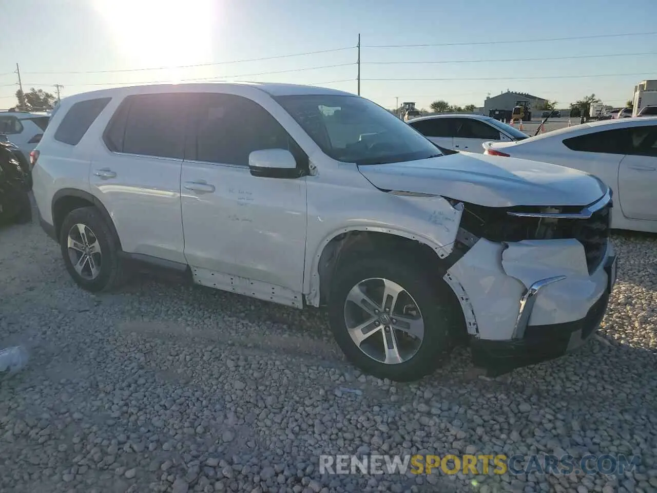 4 Photograph of a damaged car 5FNYG2H58PB008448 HONDA PILOT 2023