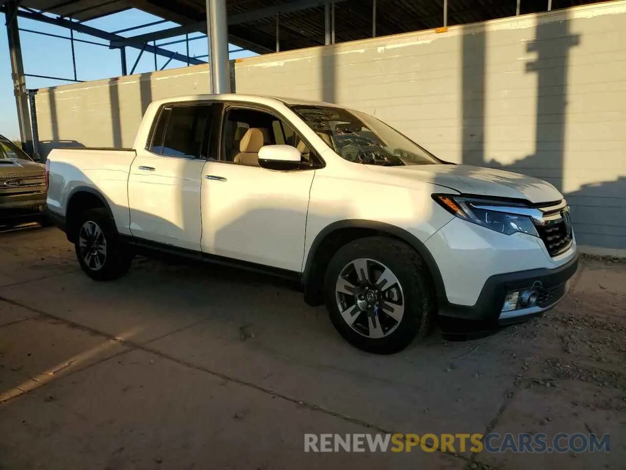 4 Photograph of a damaged car 5FPYK3F7XKB000781 HONDA RIDGELINE 2019