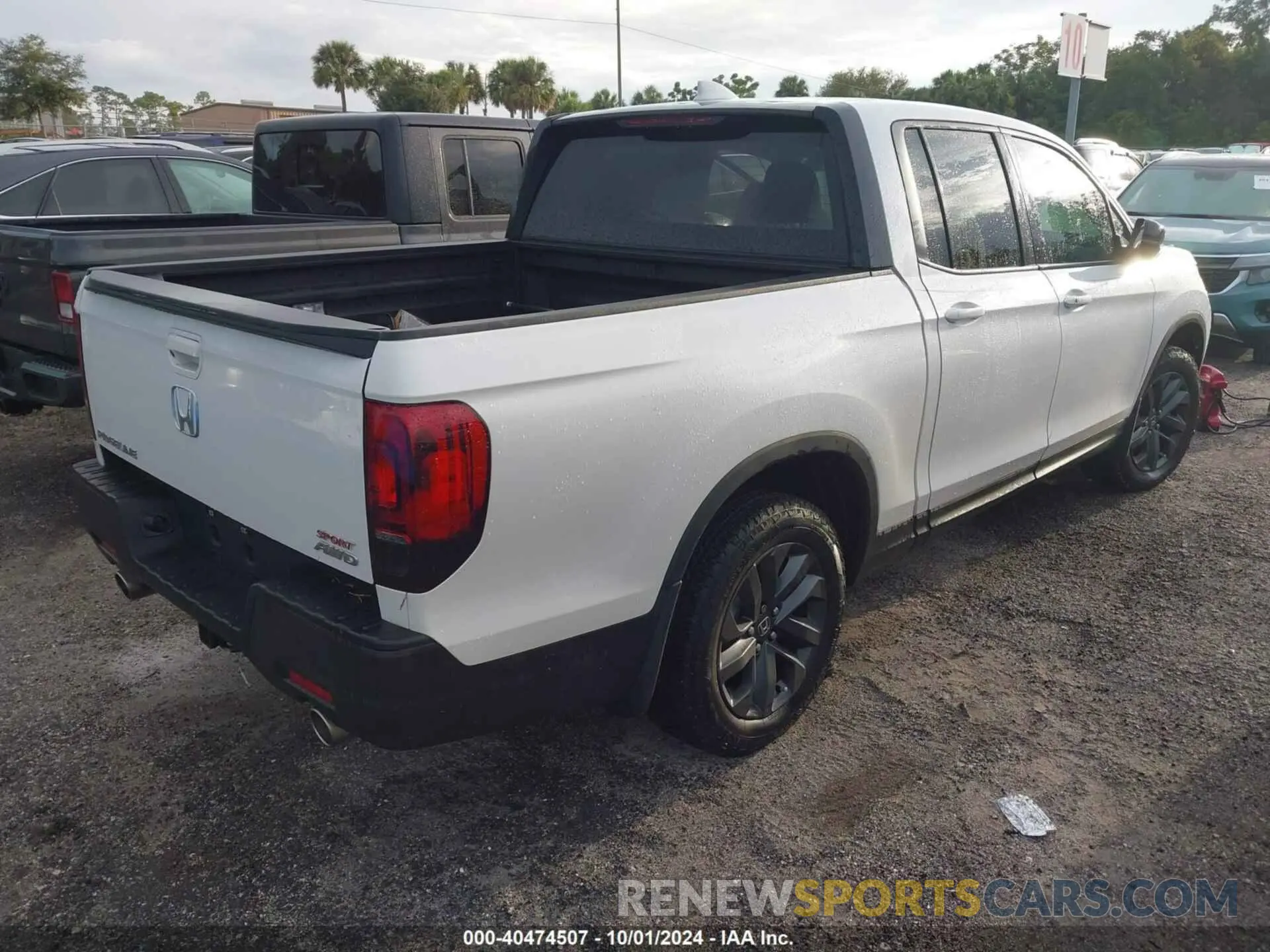 4 Photograph of a damaged car 5FPYK3F14PB049364 HONDA RIDGELINE 2023