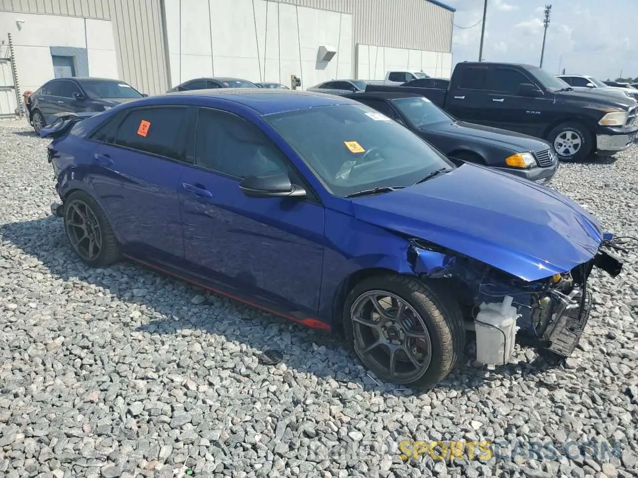 4 Photograph of a damaged car KMHLW4AK1PU011865 HYUNDAI ELANTRA 2023