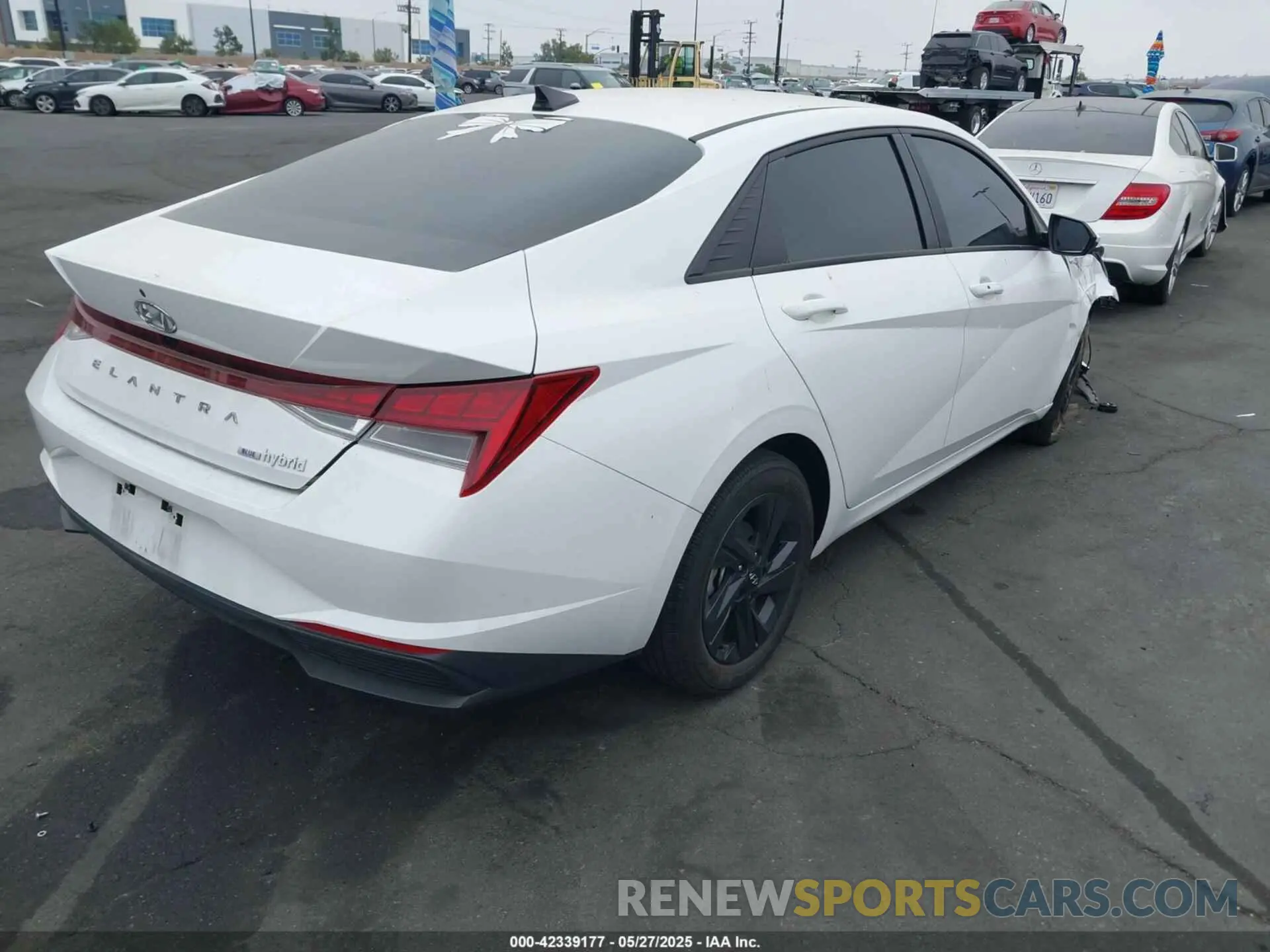 4 Photograph of a damaged car KMHLM4AJXPU077943 HYUNDAI ELANTRA HYBRID 2023