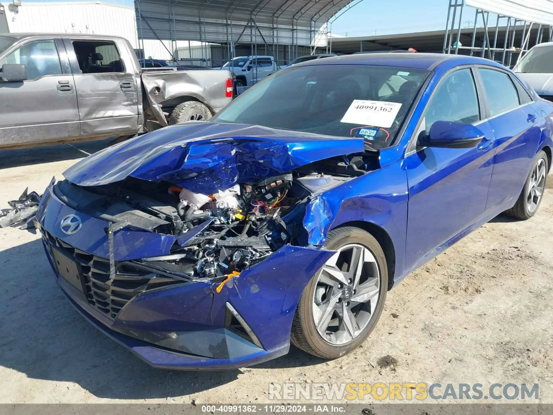 6 Photograph of a damaged car KMHLN4AJXPU063263 HYUNDAI ELANTRA HYBRID 2023