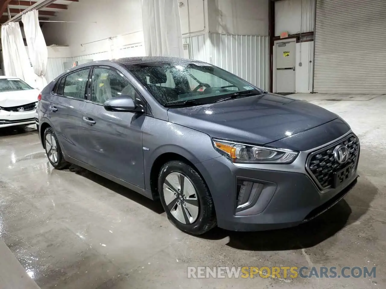 4 Photograph of a damaged car KMHC65LC8LU186345 HYUNDAI IONIQ 2020