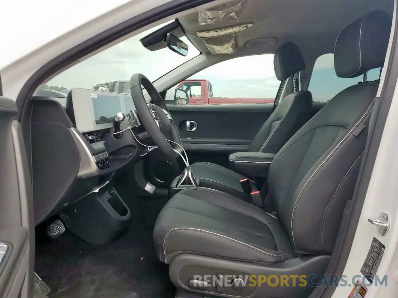 7 Photograph of a damaged car KM8KNDAF4PU231115 HYUNDAI IONIQ 2023